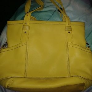 The sak purse 15inx11in and straps are 11in